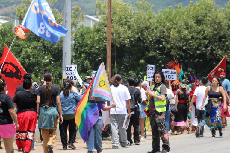 Community March Commemorates One Year Since Glass House Immigrant Attack
