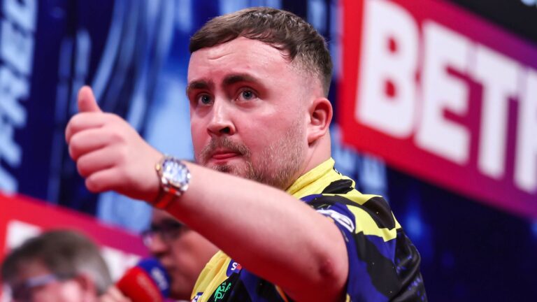 Luke Littler Shines in Blackpool Amid Ongoing Challenges at World Darts Matchplay: Best Wishes to Dirk